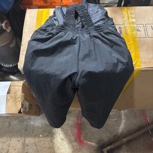 Two pairs snow pants
